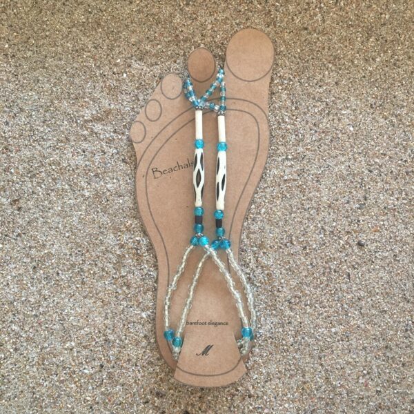 Perfect bohemian foot jewelry. Clear and blue beads with a lovely decorative piece. Hand made, beautiful, unique beaded footwear for the beach.