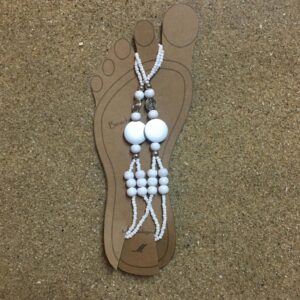 Complete your barefoot beach wedding look. Beautiful silver disc with white wooden beads to bring barefoot elegance to your special day.